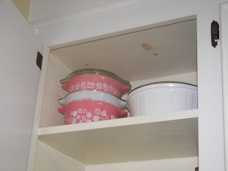 Presh's Pink Pyrex on the very top shelf